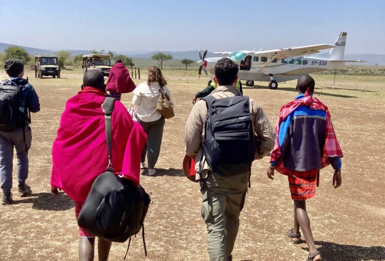 Basecamp travelers and Maasai group